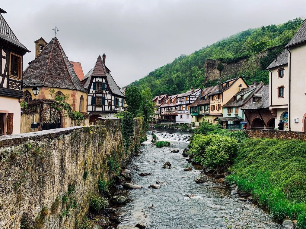 Photo by Captureson Photography on Unsplash A river in Kaysersberg, France.